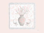 White scalloped tray with gray vase holding pink flowers and Gamma Phi Beta letters, surrounded by pink floral patterns.