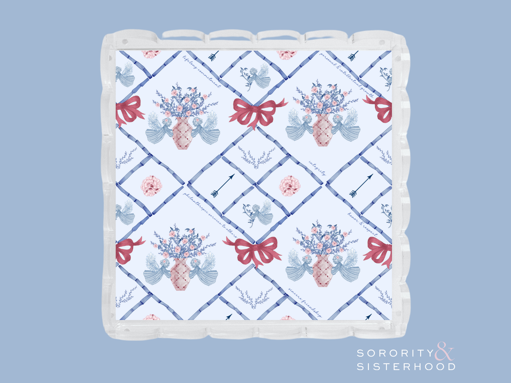 Square acrylic tray with scalloped edges, decorated with blue floral and red bow patterns over white background.