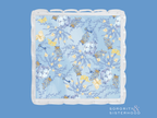 Light blue tray with scalloped edges and delicate yellow and white floral pattern.