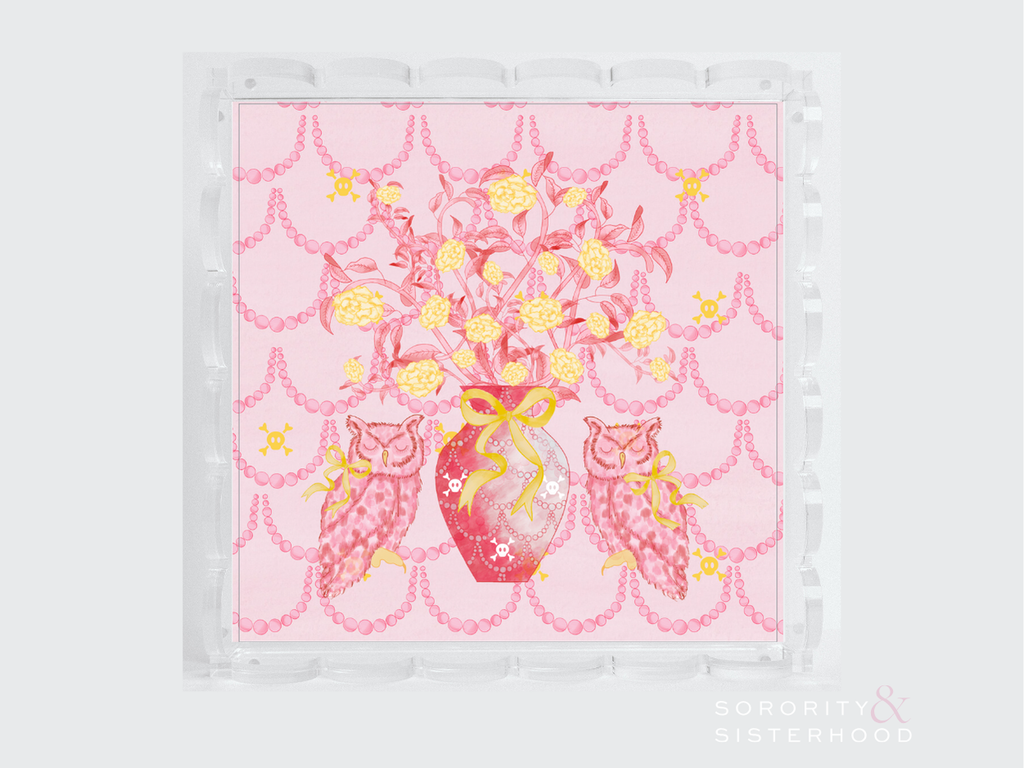 Clear acrylic tray with scalloped edges featuring a pink and gold floral design on a light pink background.