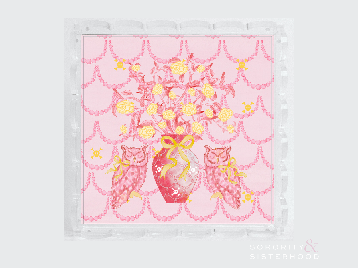 Clear acrylic tray with scalloped edges featuring a pink and gold floral design on a light pink background.