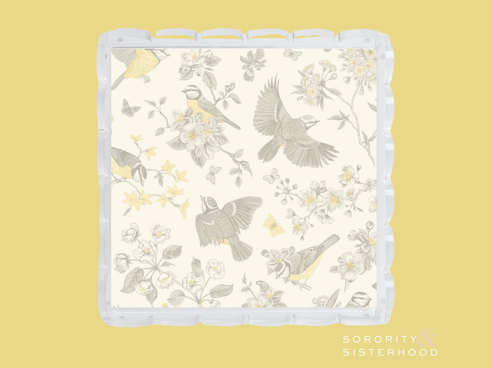 White scalloped tray with gray and yellow floral and bird pattern, clear edges.
