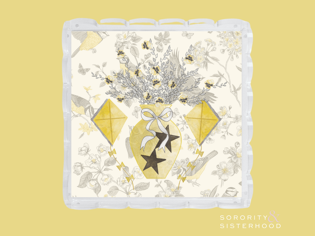 White ceramic tray with scalloped edges featuring gold and gray floral and geometric designs with Kappa Alpha Theta symbols.