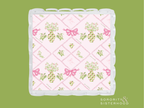 Rectangular acrylic tray with pink scalloped edges, featuring floral and green grapevine patterns with pink bows on a light.