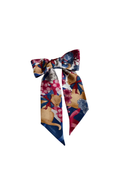 Multicolor floral and abstract print silk scarf with bow shape and long tails.