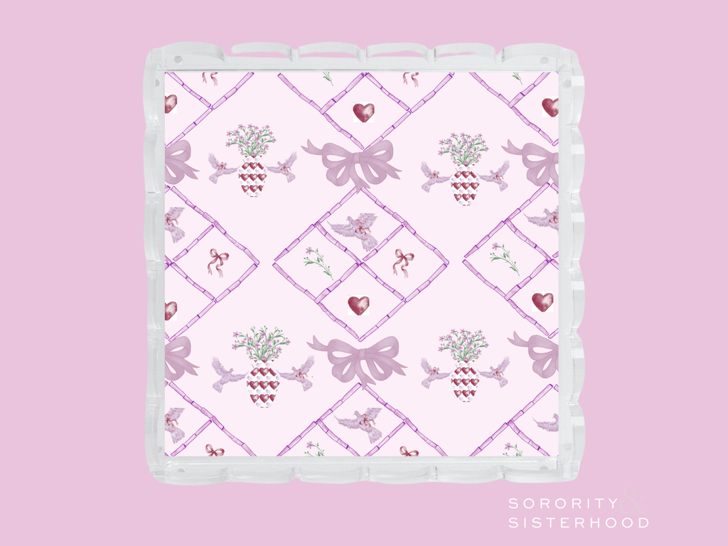 Square scalloped tray with pink lavender bow and heart pattern on white background.