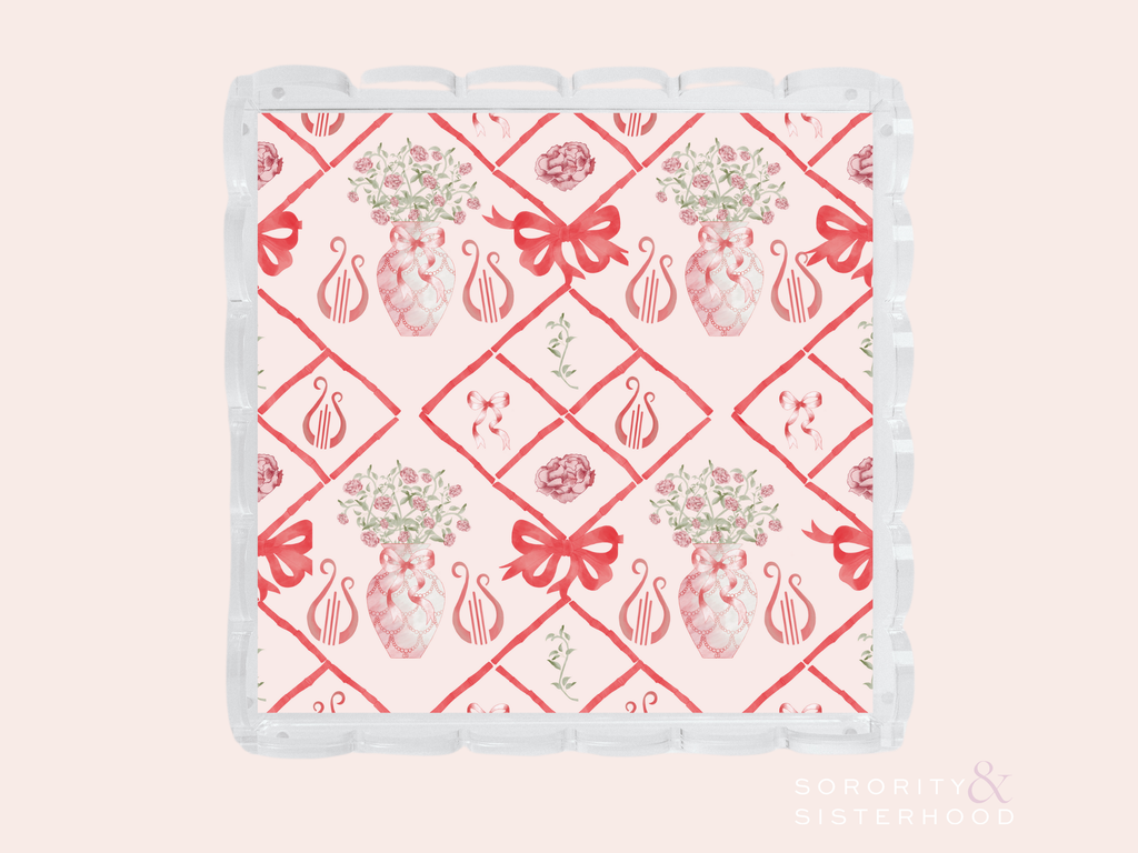 White acrylic tray with scalloped edges featuring red Alpha Chi Omega logos and floral designs in a diamond pattern.