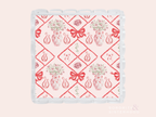 White acrylic tray with scalloped edges featuring red Alpha Chi Omega logos and floral designs in a diamond pattern.