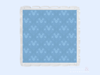 Blue acrylic tray with scalloped edges and subtle floral pattern embossed on surface.
