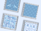 Set of four acrylic scalloped trays in various blue floral and geometric patterns with clear edges.