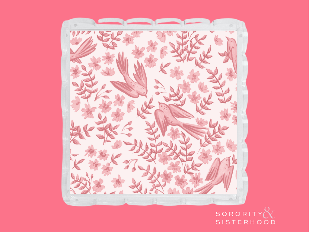 Square acrylic tray with scalloped edges and pink floral and leaf pattern.