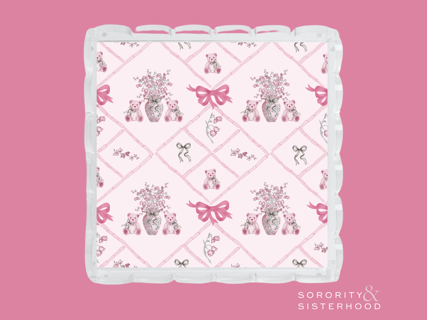 Square acrylic tray with scalloped edges, featuring pink floral bouquets, bows, and Alpha Phi symbols on a white background.