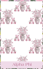 White pajama shorts with pink teddy bears holding bouquets and pink Alpha Phi logo band waistband.