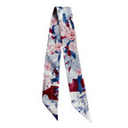Blue and burgundy floral printed silk scarflette with pointed ends.
